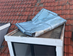 lekkage door weggewaaide zinken daken en daktrimmen